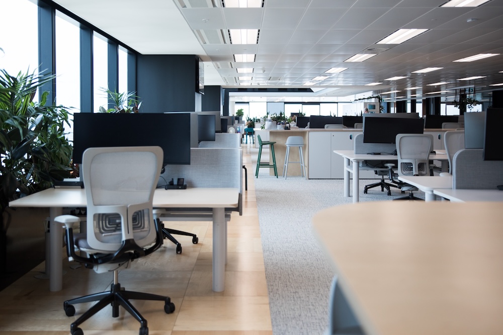 Spacious Class A office space featuring sleek desks, collaborative workspace design, and premium office interiors